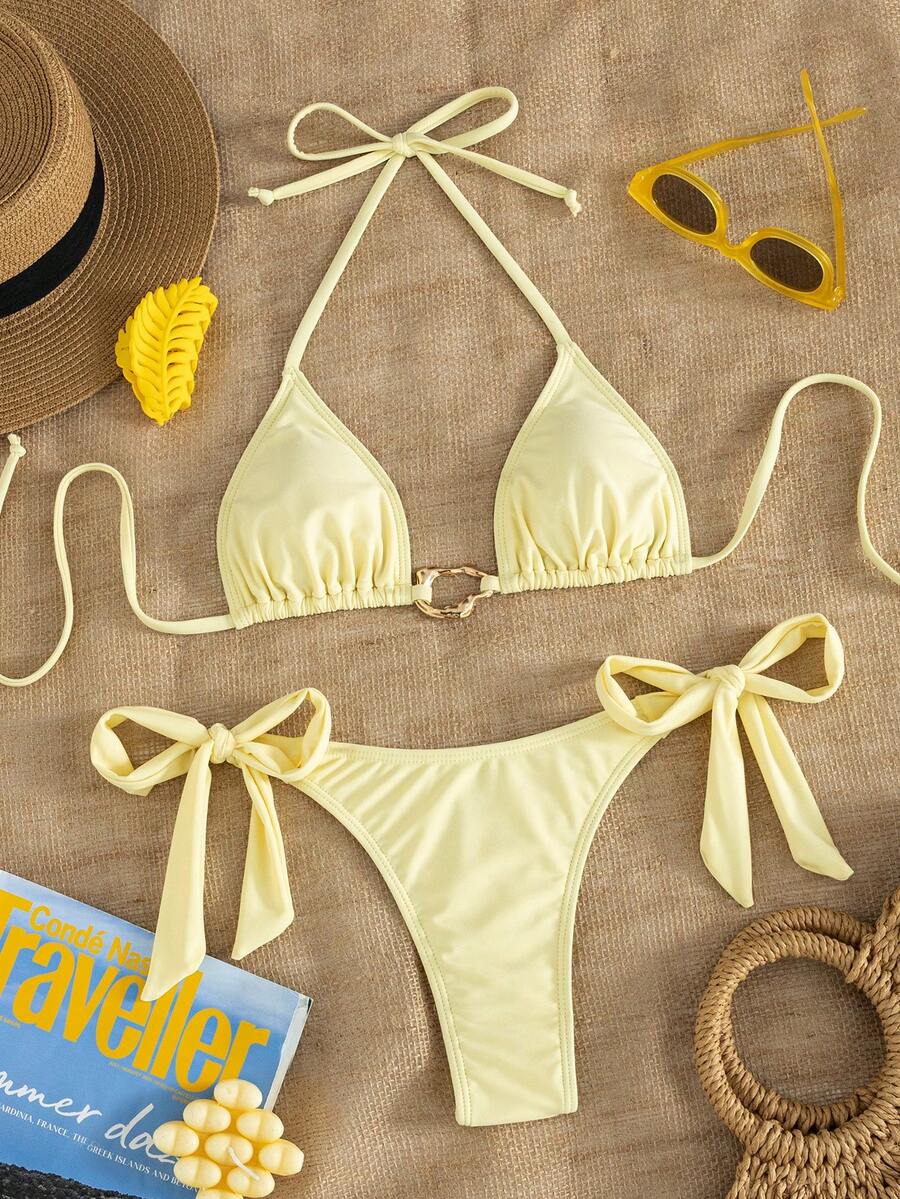 Red halter tie-side bikini set for women featuring a geometric plaid pattern, high-waisted bottoms, wireless triangle cups, and removable padding.