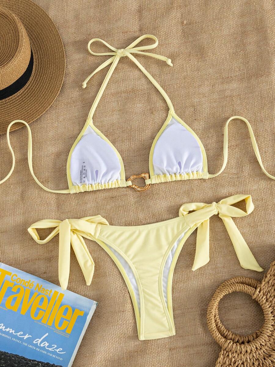 Red halter tie-side bikini set for women featuring a geometric plaid pattern, high-waisted bottoms, wireless triangle cups, and removable padding.