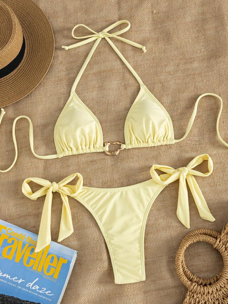 Red halter tie-side bikini set for women featuring a geometric plaid pattern, high-waisted bottoms, wireless triangle cups, and removable padding.
