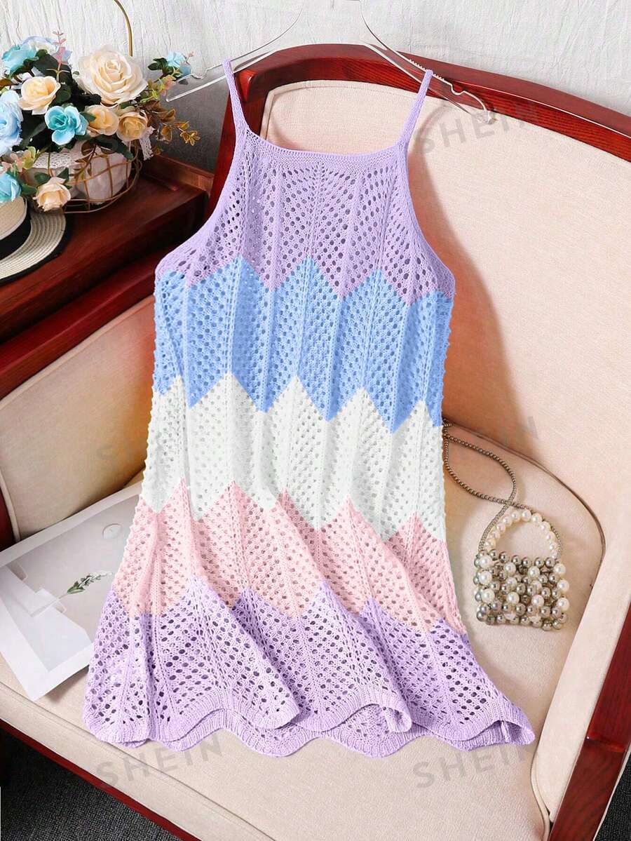 Girls' multicolor rainbow gradient crochet beach cover up with hollow-out knit design, spaghetti straps, sleeveless A-line shape, and semi-sheer finish.
