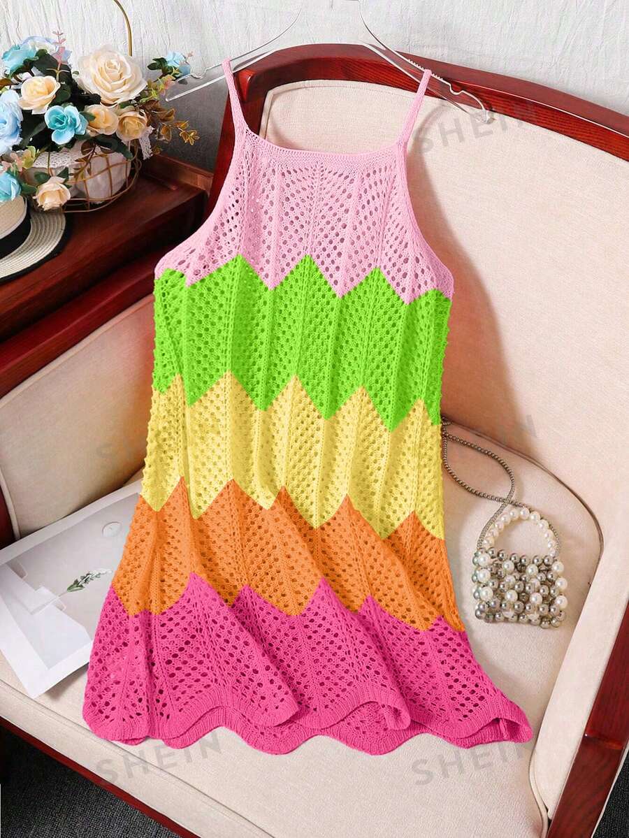 Girls' multicolor rainbow gradient crochet beach cover up with hollow-out knit design, spaghetti straps, sleeveless A-line shape, and semi-sheer finish.