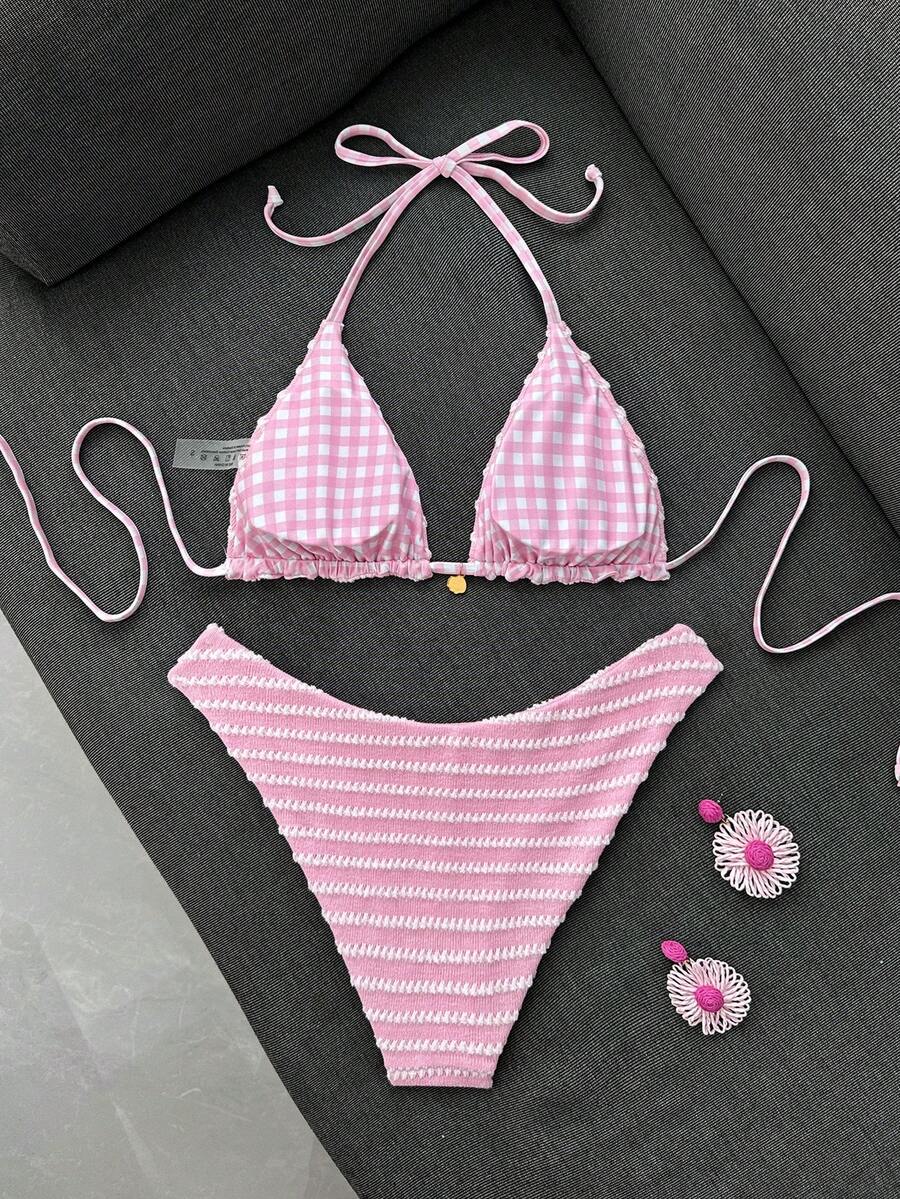 Women's black textured plaid 2-piece bikini set featuring a halter neckline, wireless triangle cups with removable padding, and mid-waist bottoms.
