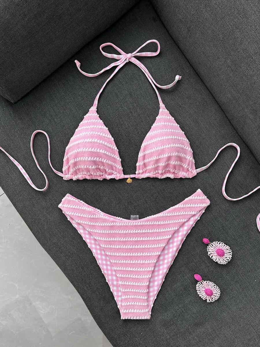 Women's black textured plaid 2-piece bikini set featuring a halter neckline, wireless triangle cups with removable padding, and mid-waist bottoms.