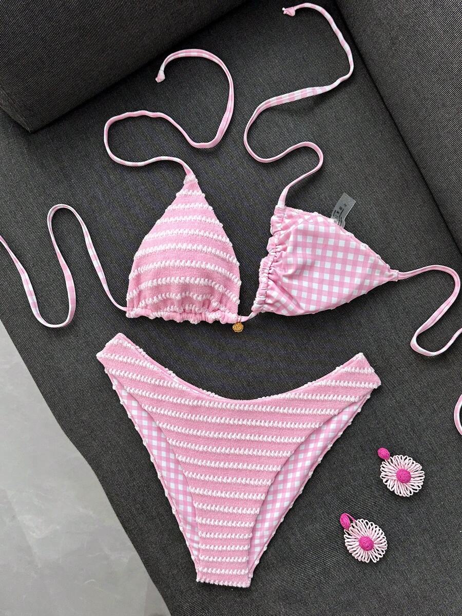 Women's black textured plaid 2-piece bikini set featuring a halter neckline, wireless triangle cups with removable padding, and mid-waist bottoms.