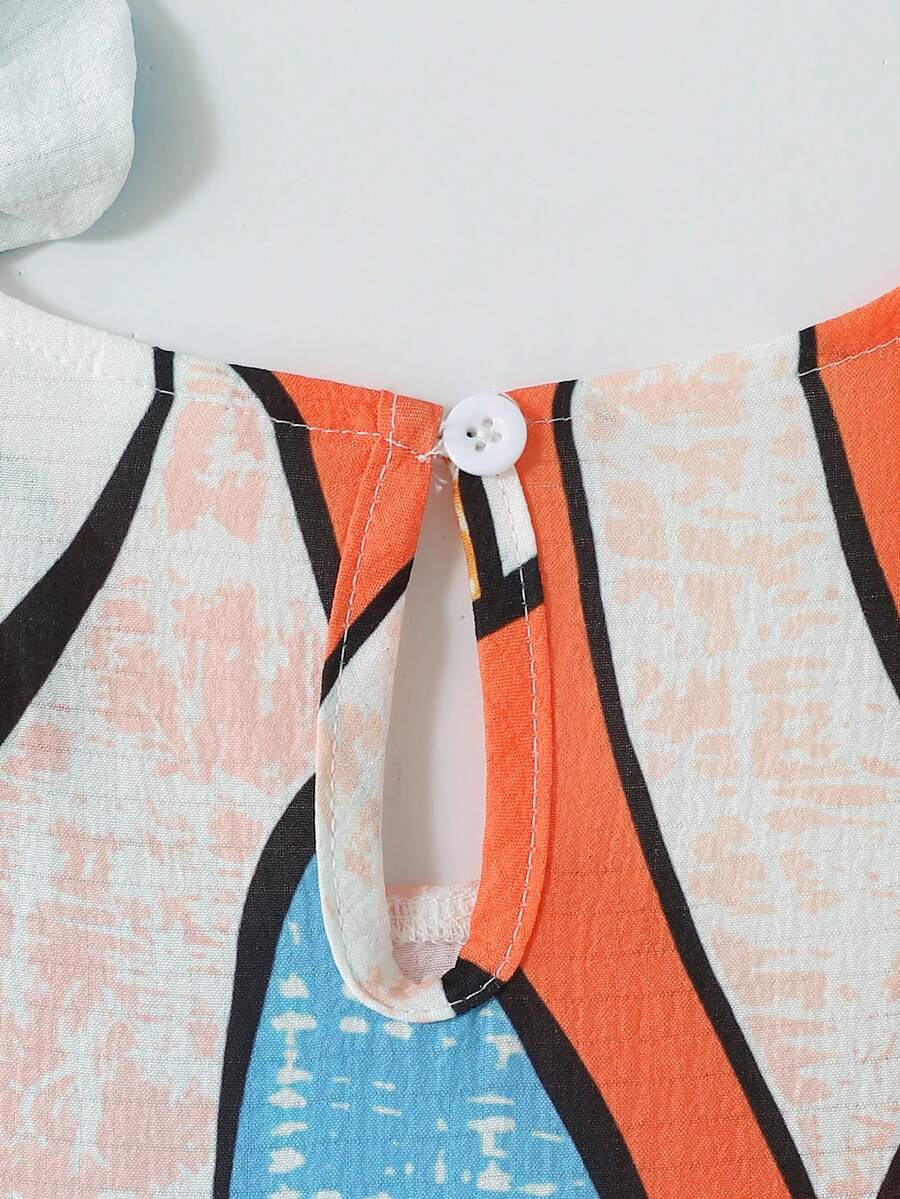 Tween girls blue striped sleeveless smock dress featuring a round neckline, high waist, and flounce ruffle hem.