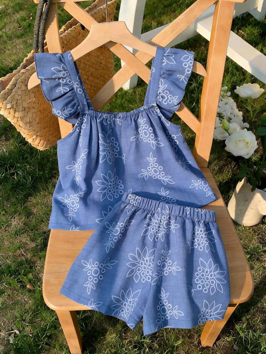Tween girls 2-piece bohemian outfit set in apricot featuring a square neck embroidered sleeveless camisole top and matching floral wide leg shorts.