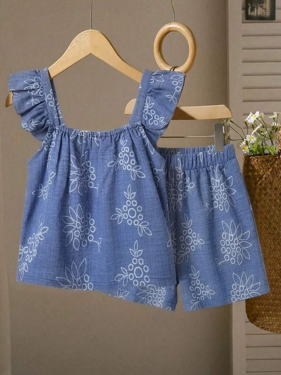 Tween girls 2-piece bohemian outfit set in apricot featuring a square neck embroidered sleeveless camisole top and matching floral wide leg shorts.