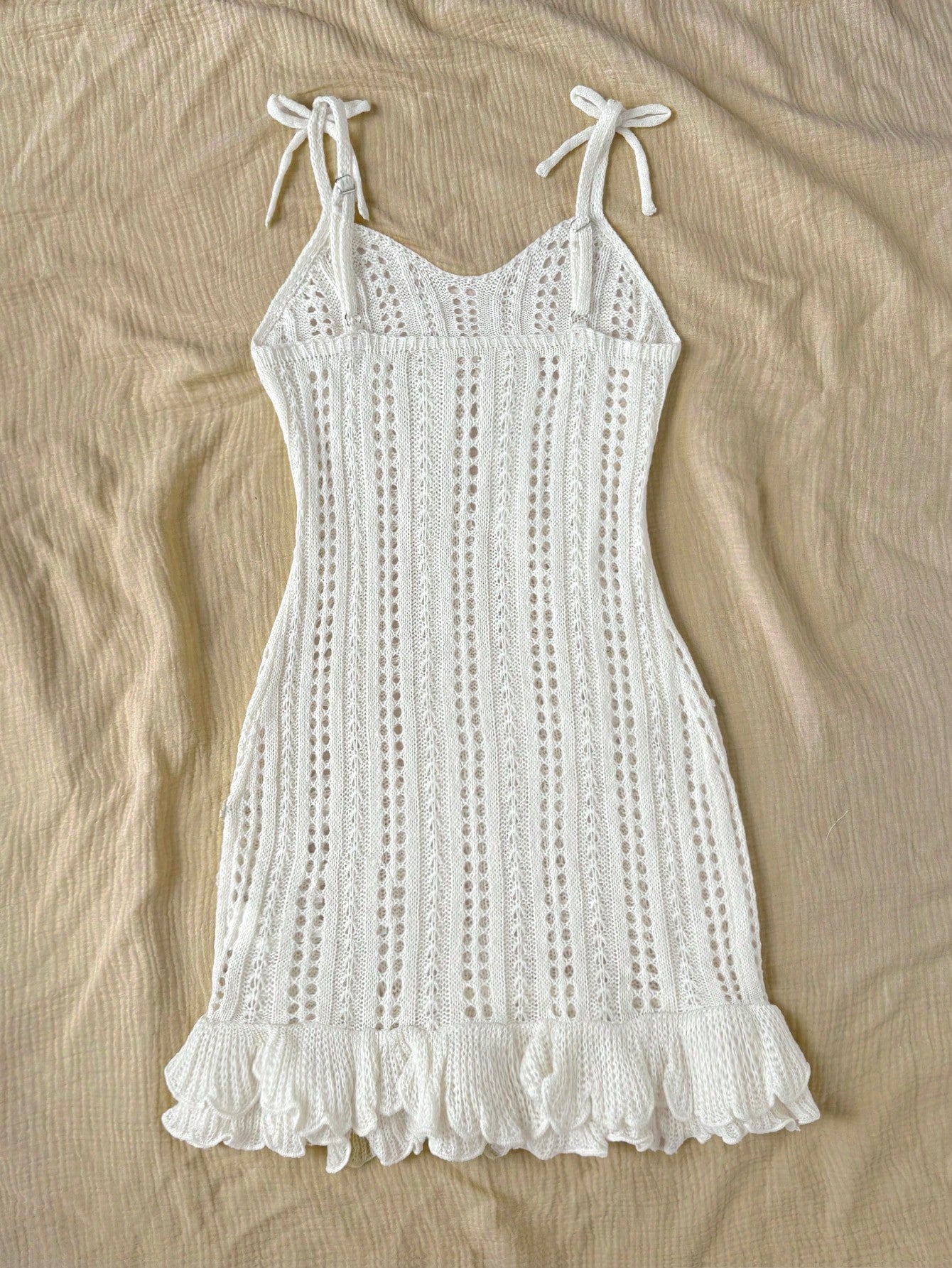 Apricot tween girl beach cover-up dress with spaghetti straps, ruffle details, hollow out design, and 3D starfish decor