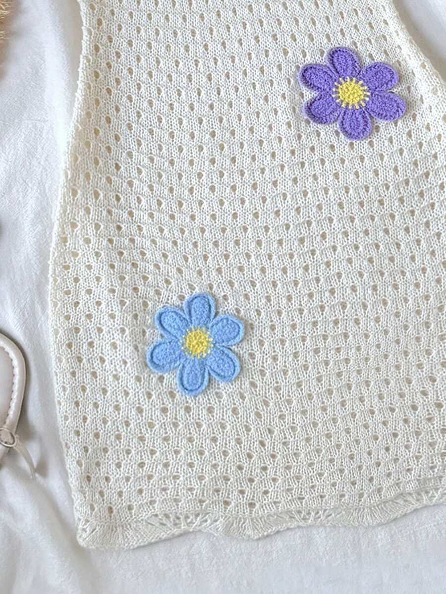 Beige handmade crochet cover up dress for tween girls with 3D floral appliques, button details, spaghetti straps, and sleeveless beach vacation styling.