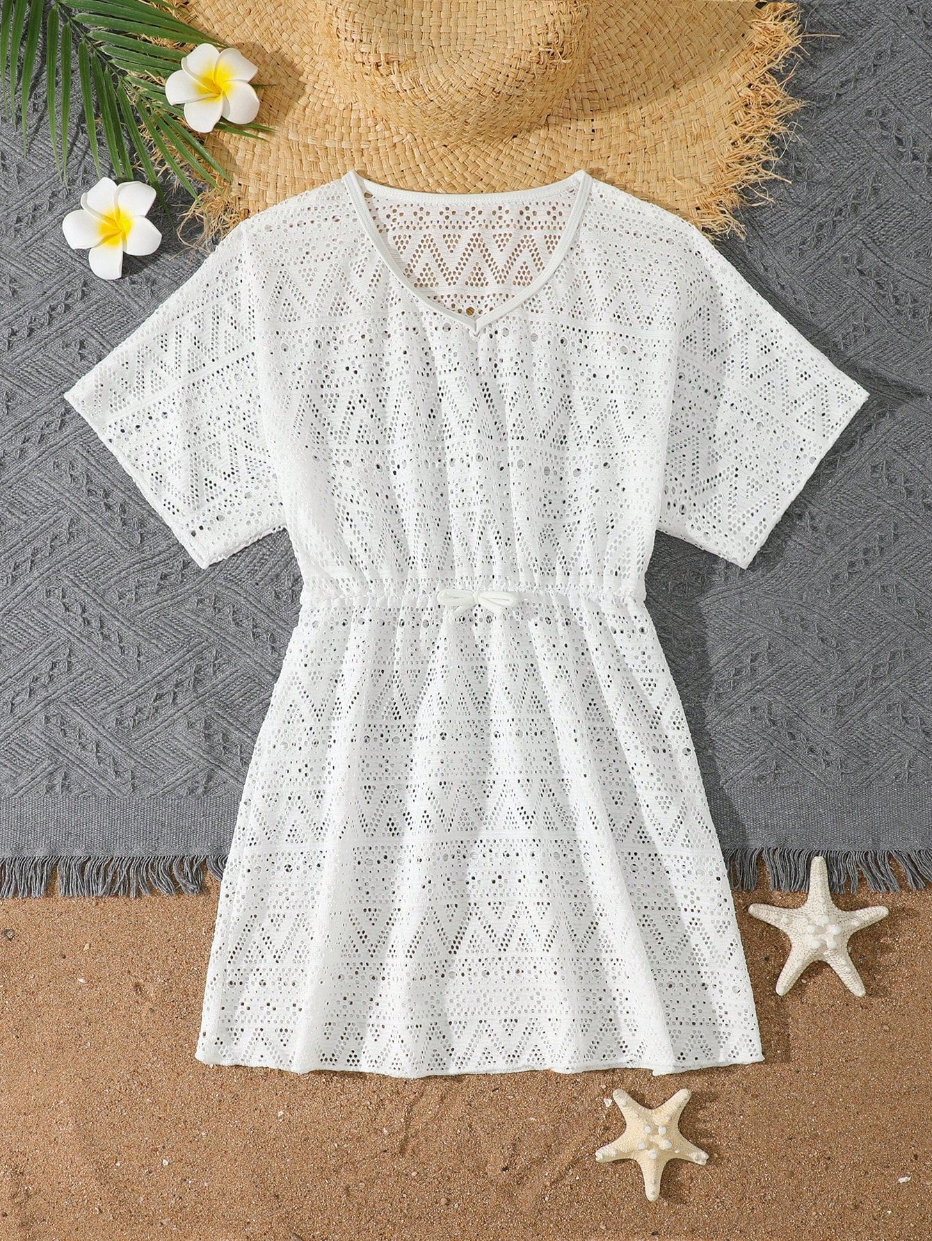 White tween girls swimsuit cover-up with V neck, short sleeves, contrast lace, fringe details, and regular length mesh fabric for beachwear