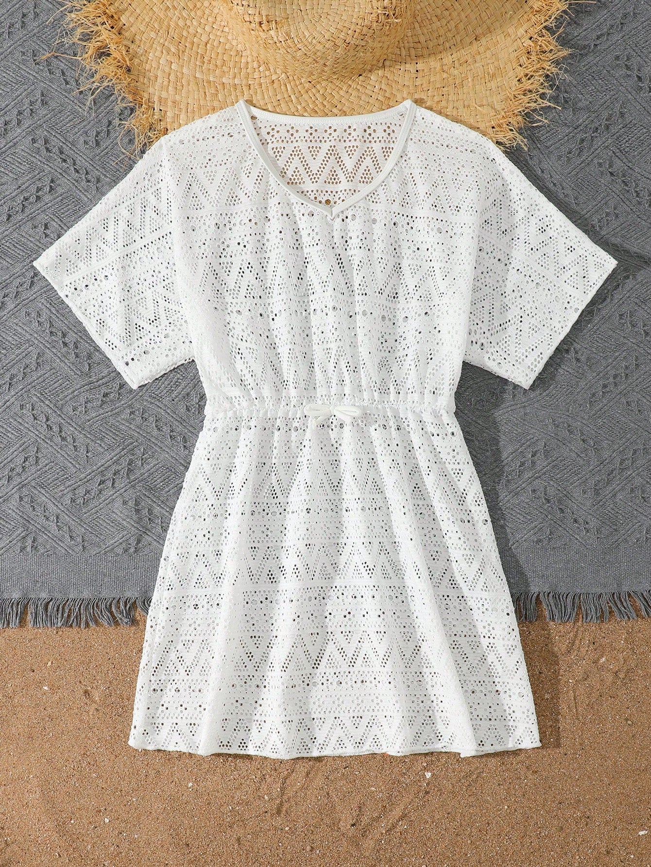White tween girls swimsuit cover-up with V neck, short sleeves, contrast lace, fringe details, and regular length mesh fabric for beachwear