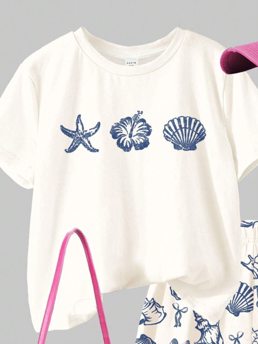 Tween girls 2-piece summer casual outfit featuring a multicolor seashell print short sleeve T-shirt with drop shoulders and matching loose fit shorts with pockets.
