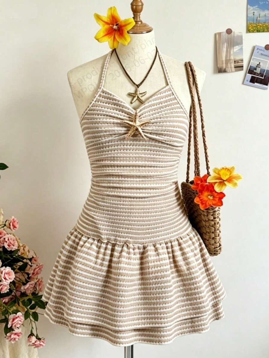 Tween girls apricot sleeveless halter mini dress with textured starfish and shell decor, shirred tiered layer, high waist, and flounce hem.