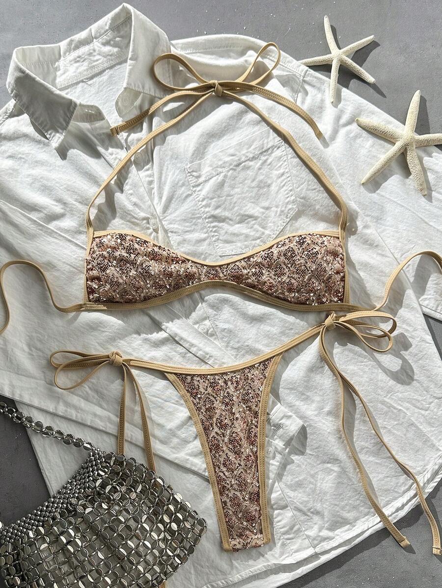 Apricot 2-piece sequin textured halter bikini set featuring a wireless top with lace-up backless ties and matching low-waist side-tie thong bottoms.