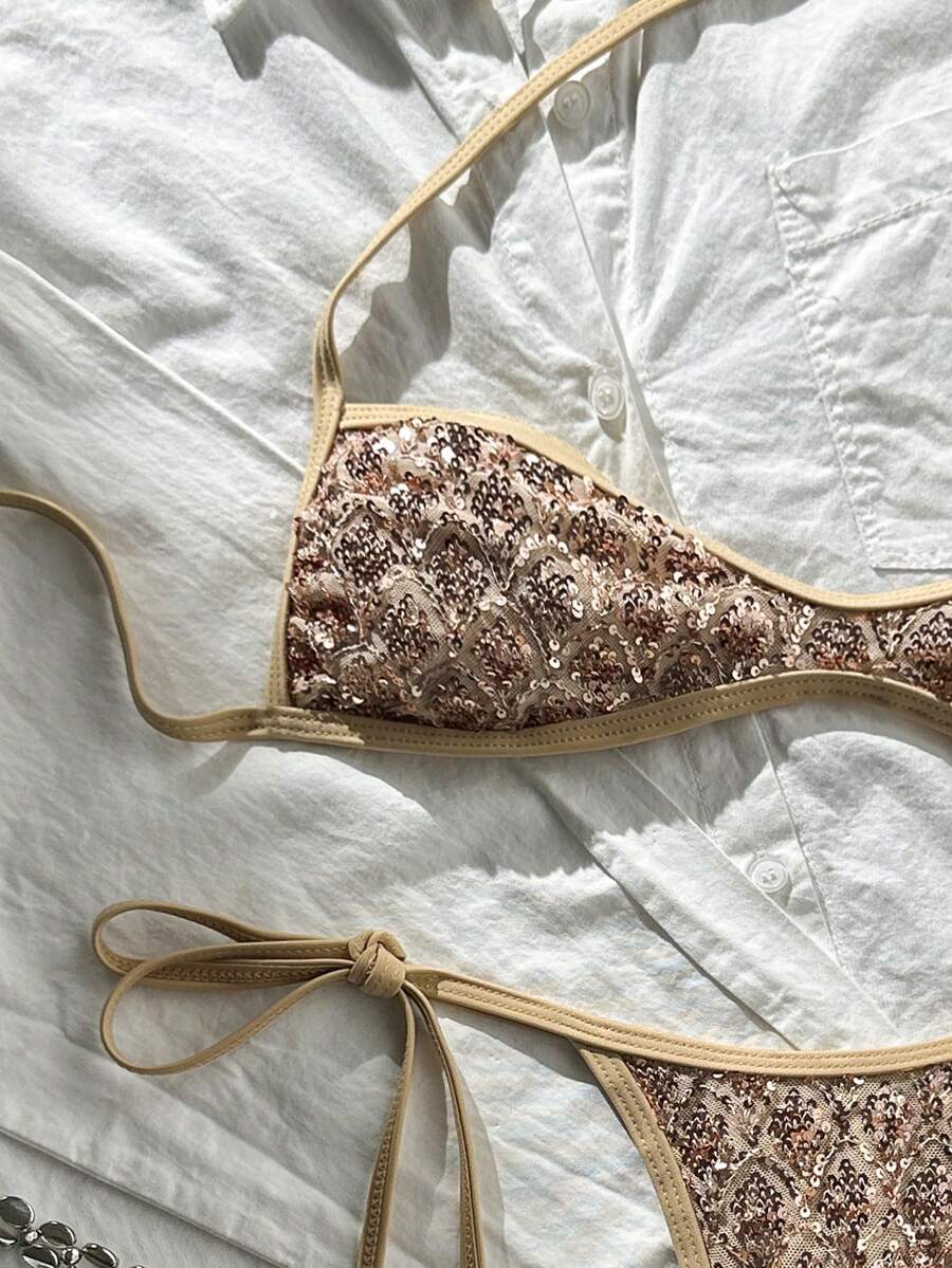 Apricot 2-piece sequin textured halter bikini set featuring a wireless top with lace-up backless ties and matching low-waist side-tie thong bottoms.
