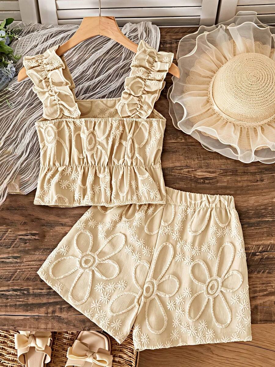 Apricot two-piece summer outfit for tween girls featuring a sleeveless pleated square-neck camisole top with button details and matching gathered shorts.