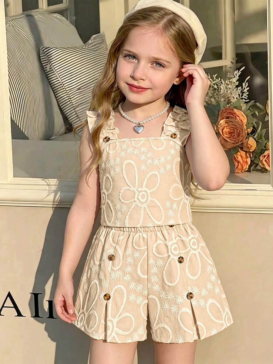 Apricot two-piece summer outfit for tween girls featuring a sleeveless pleated square-neck camisole top with button details and matching gathered shorts.