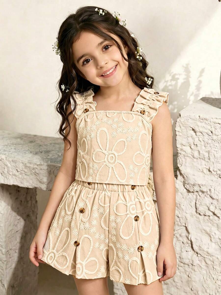 Apricot two-piece summer outfit for tween girls featuring a sleeveless pleated square-neck camisole top with button details and matching gathered shorts.