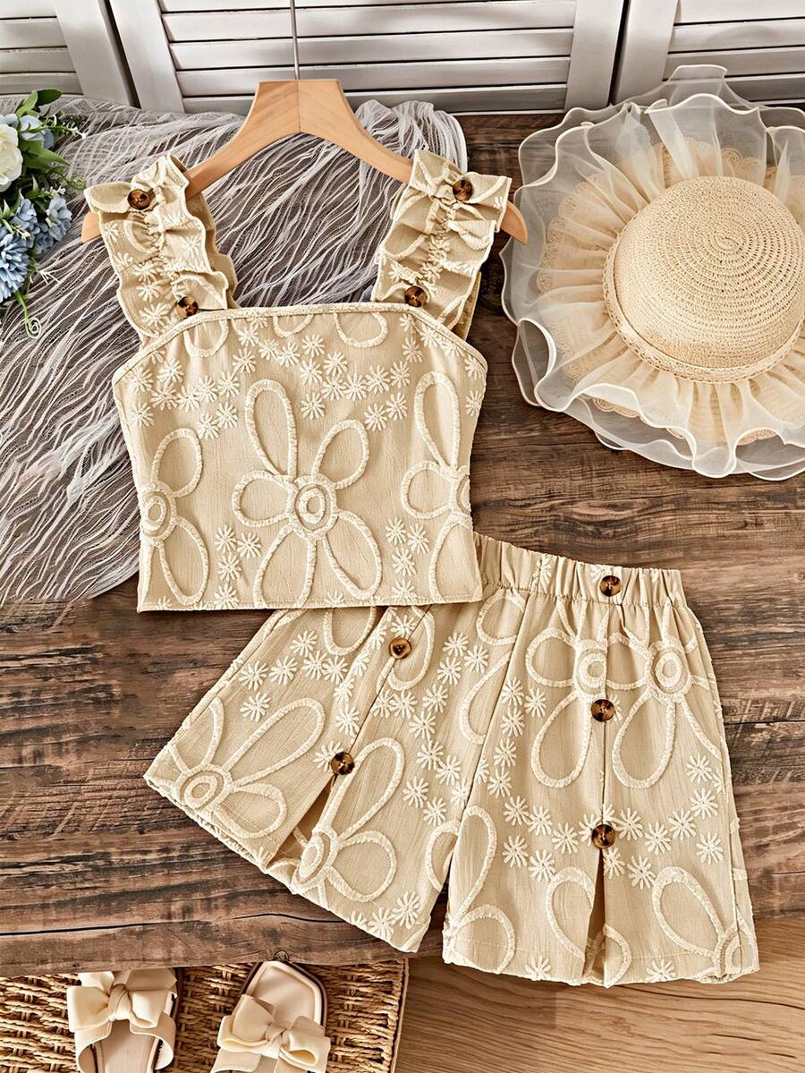 Apricot two-piece summer outfit for tween girls featuring a sleeveless pleated square-neck camisole top with button details and matching gathered shorts.