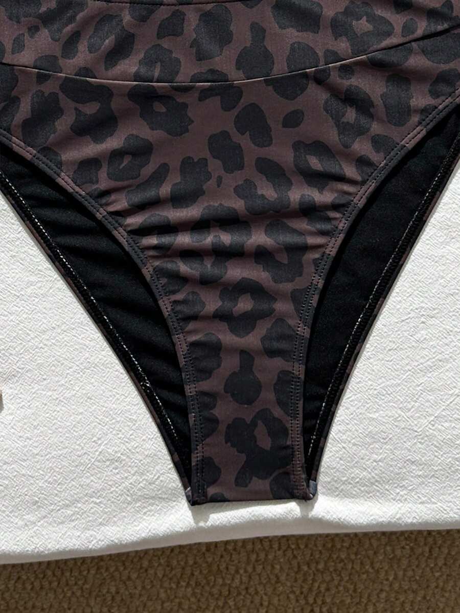 Women's black 2-piece high waist bikini swimsuit set featuring spaghetti straps, criss-cross knot details, wireless bra with removable padding, and high-stretch fabric.