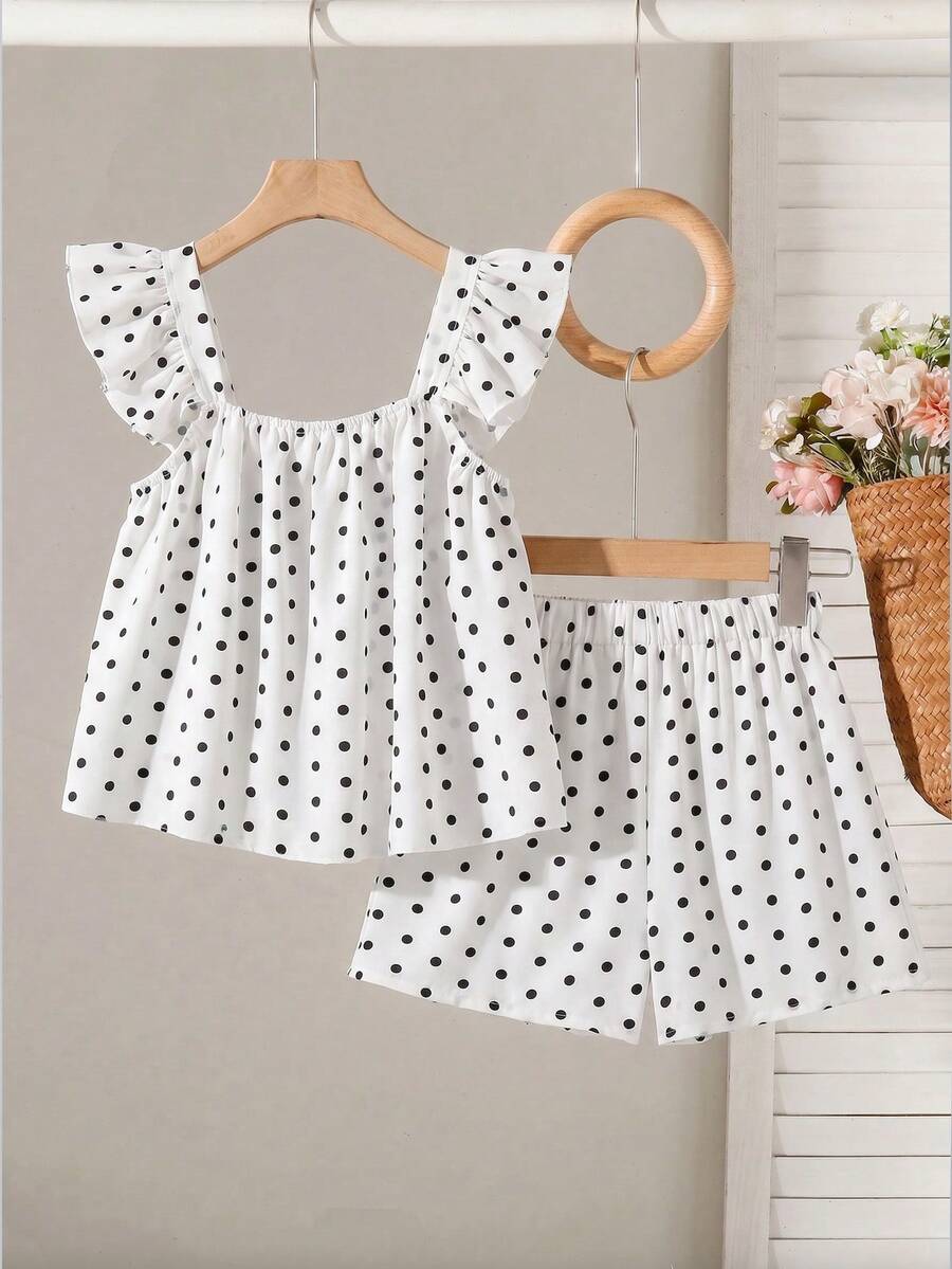 Tween girls 2-piece bohemian outfit set in apricot featuring a square neck embroidered sleeveless camisole top and matching floral wide leg shorts.
