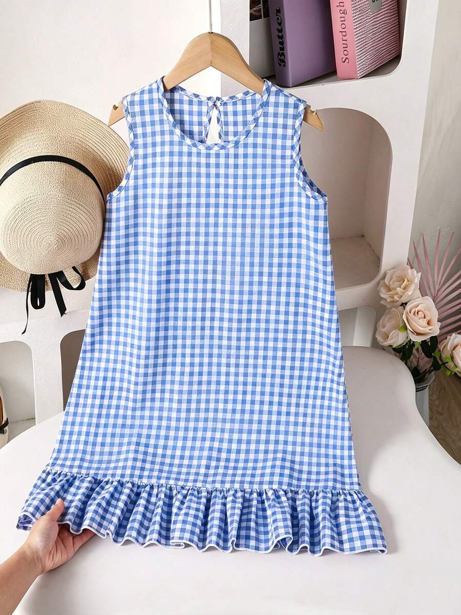 Tween girls casual leopard print smock mini dress featuring a round neck and flounce ruffle hem.