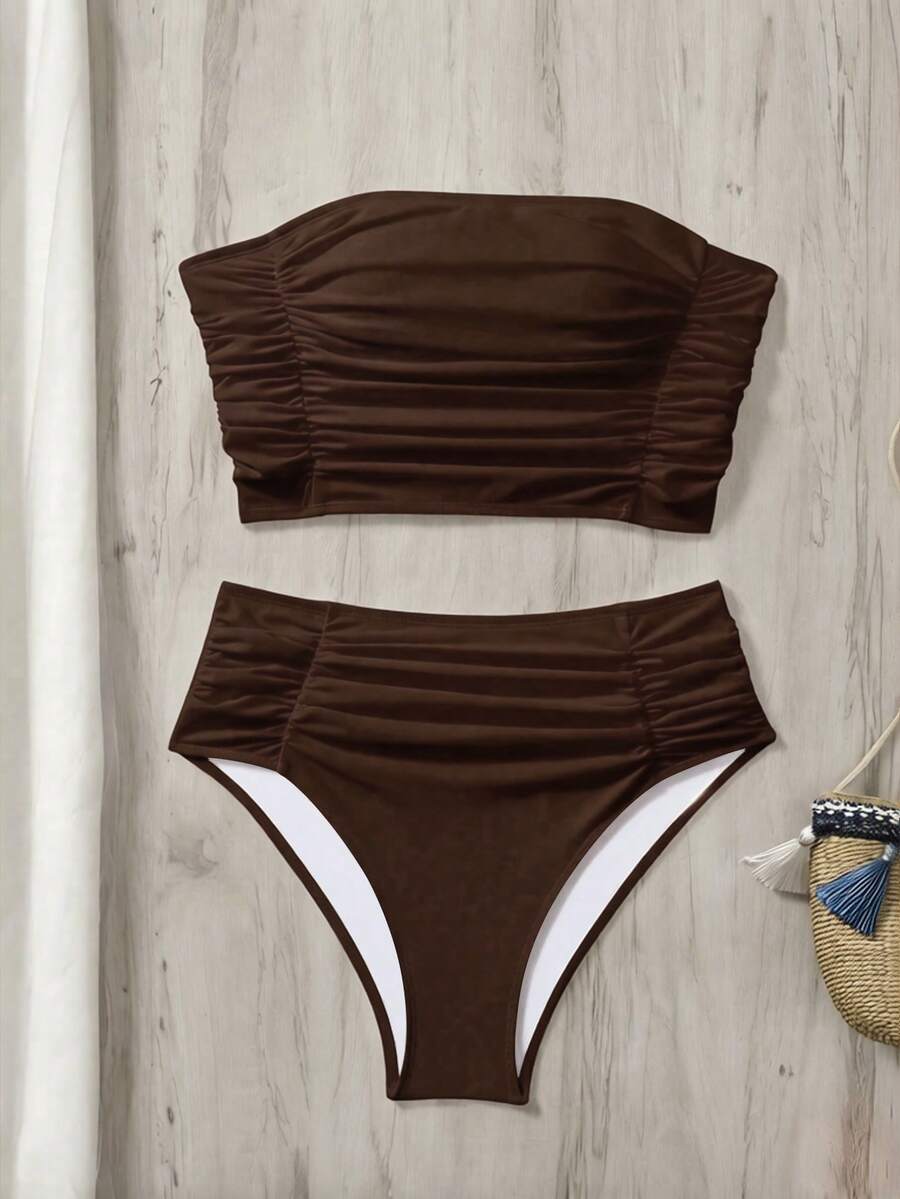 Women's black strapless ruched bandeau bikini top with high waisted bottoms