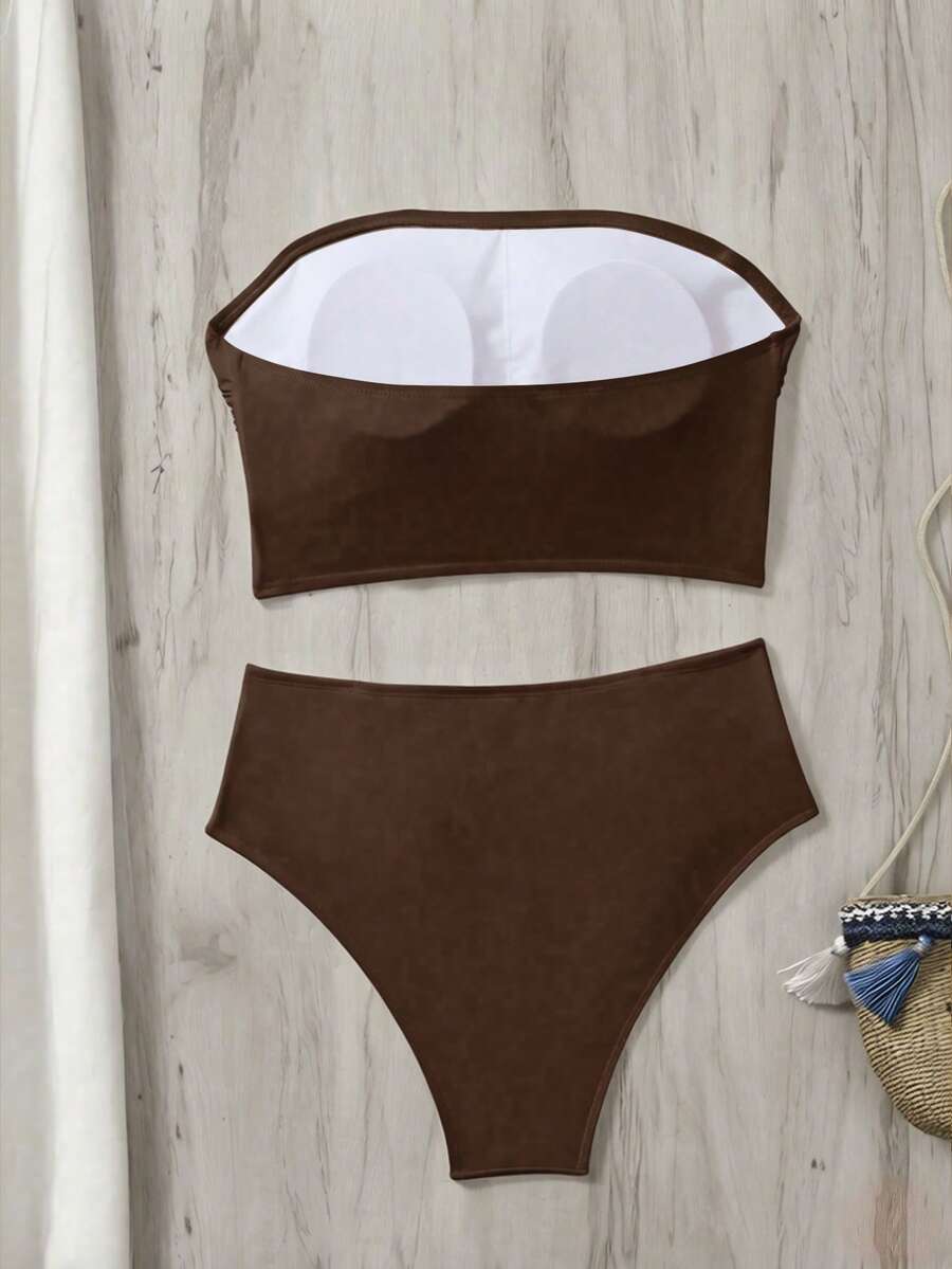 Women's black strapless ruched bandeau bikini top with high waisted bottoms