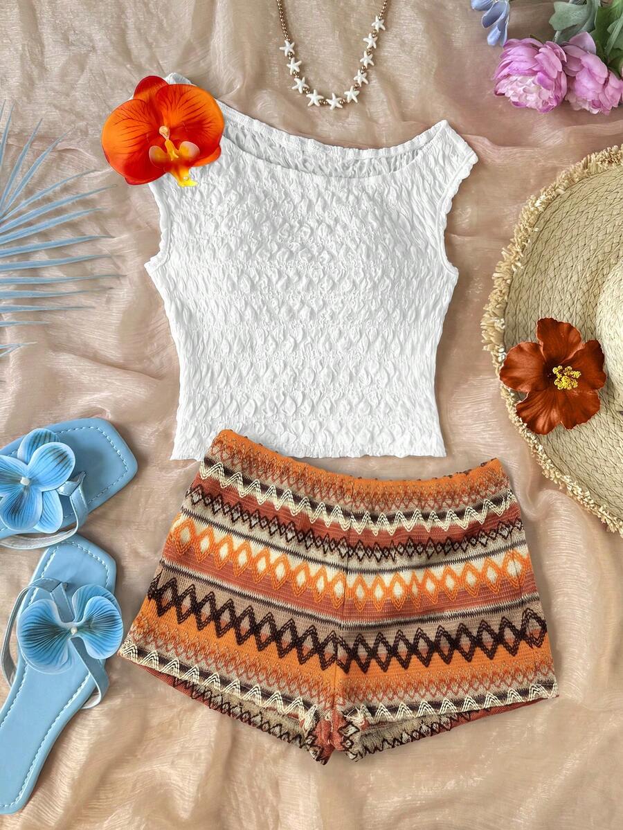 Tween girls 2-piece summer clothing set featuring a black asymmetric rib-knit striped off-shoulder t-shirt and matching slim fit shorts.