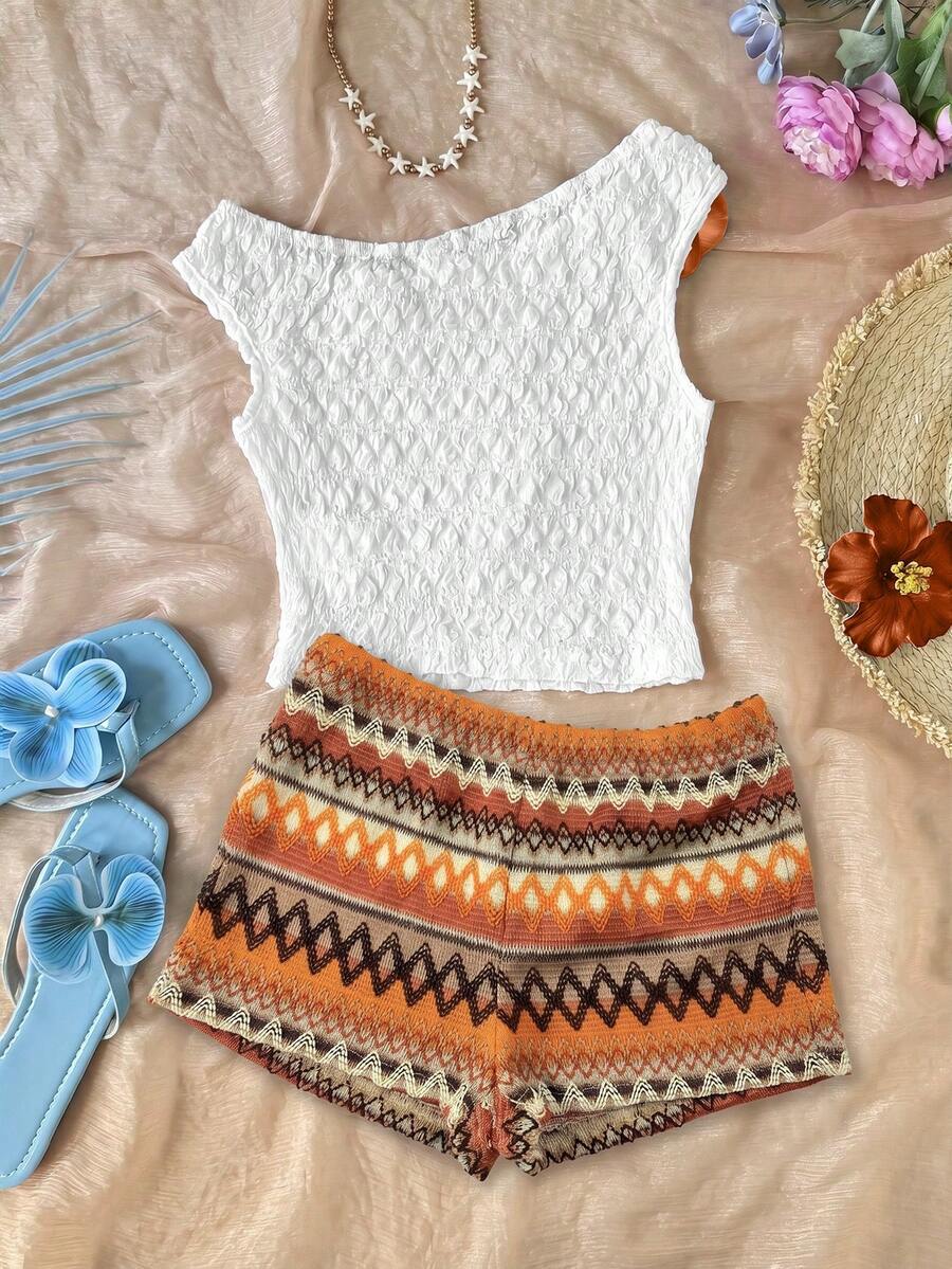 Tween girls 2-piece summer clothing set featuring a black asymmetric rib-knit striped off-shoulder t-shirt and matching slim fit shorts.