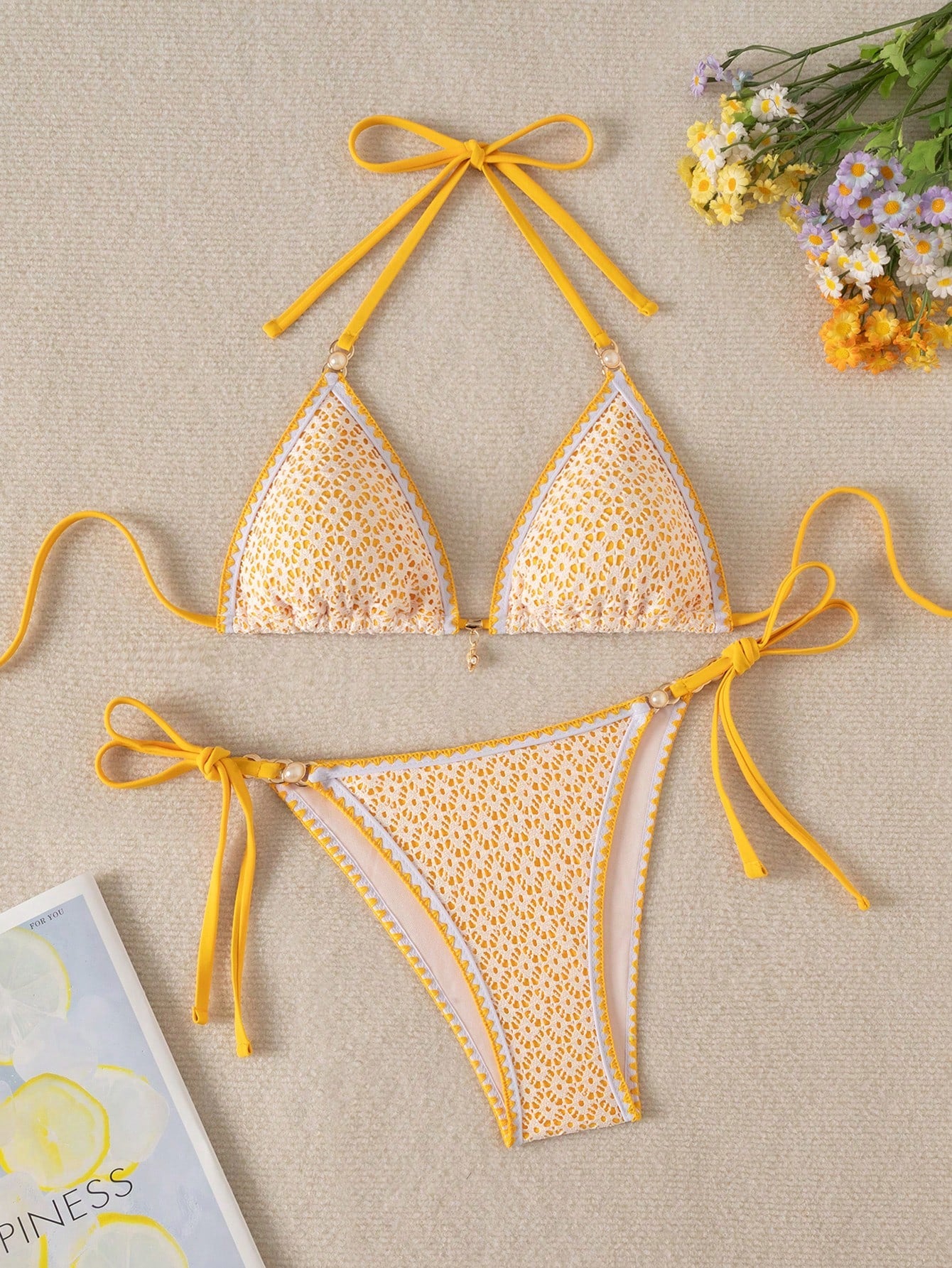 Women's triangle bikini set with contrast lace wireless bra top and ultra high waist tie side bottoms.