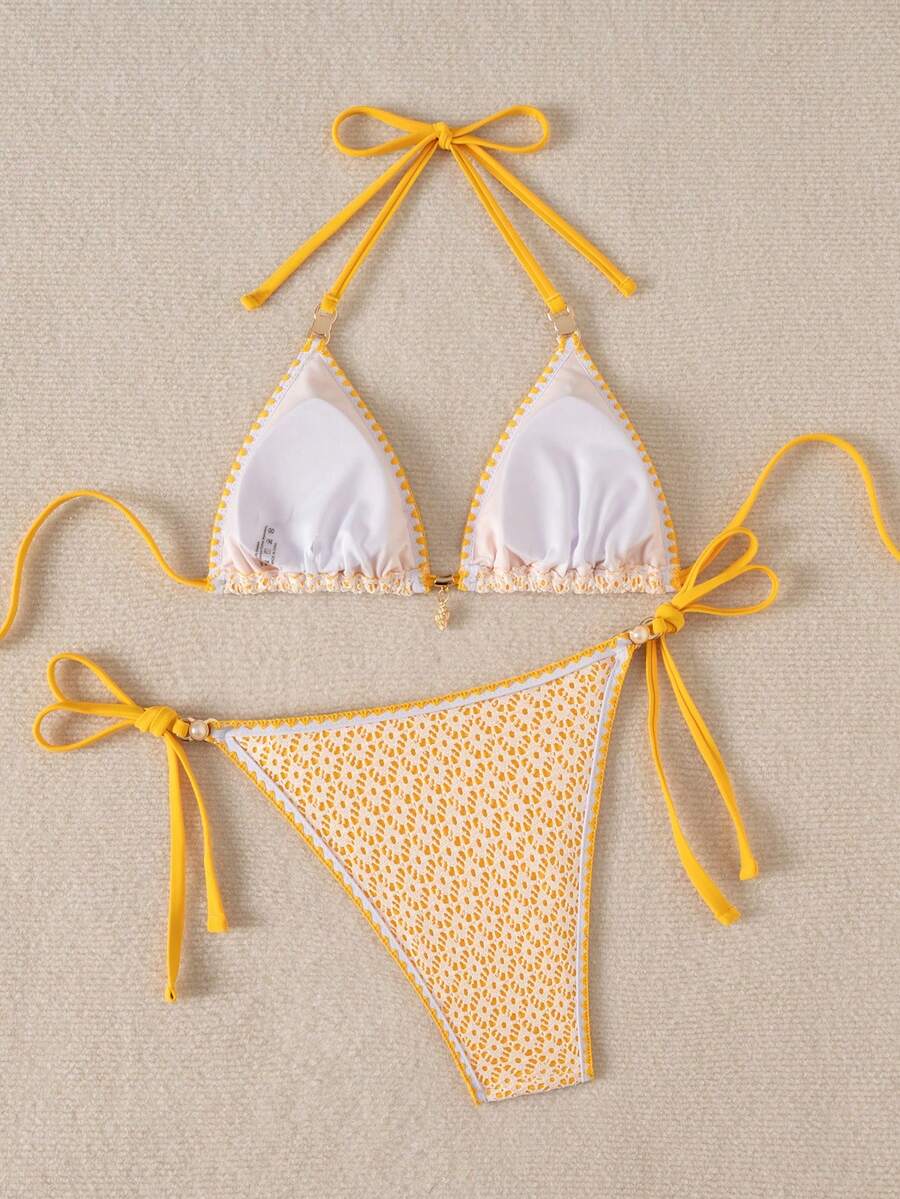 Women's triangle bikini set with contrast lace wireless bra top and ultra high waist tie side bottoms.