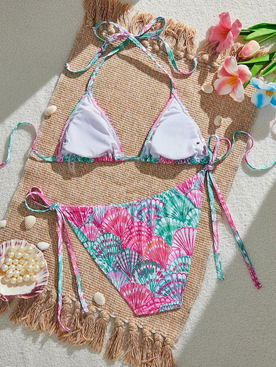 Women's black and white zebra print two-piece bikini set featuring a high waist tie-side bottom and a backless halter top with removable padding.