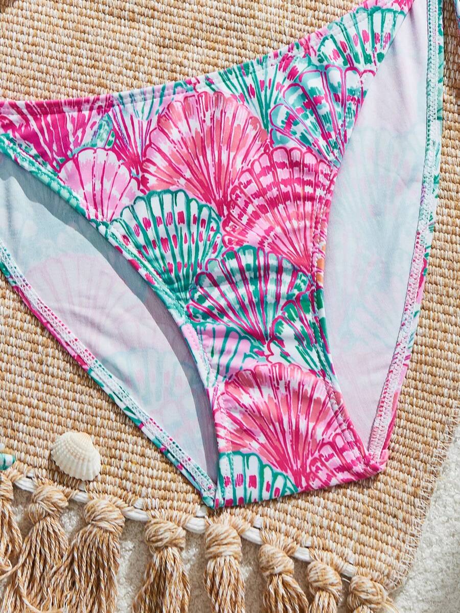 Women's black and white zebra print two-piece bikini set featuring a high waist tie-side bottom and a backless halter top with removable padding.