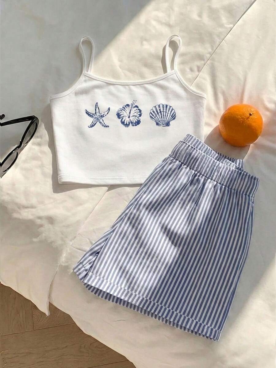 Tween girls summer 2-piece Hawaiian style outfit featuring a graphic print spaghetti strap camisole top with contrast piping and matching casual shorts.