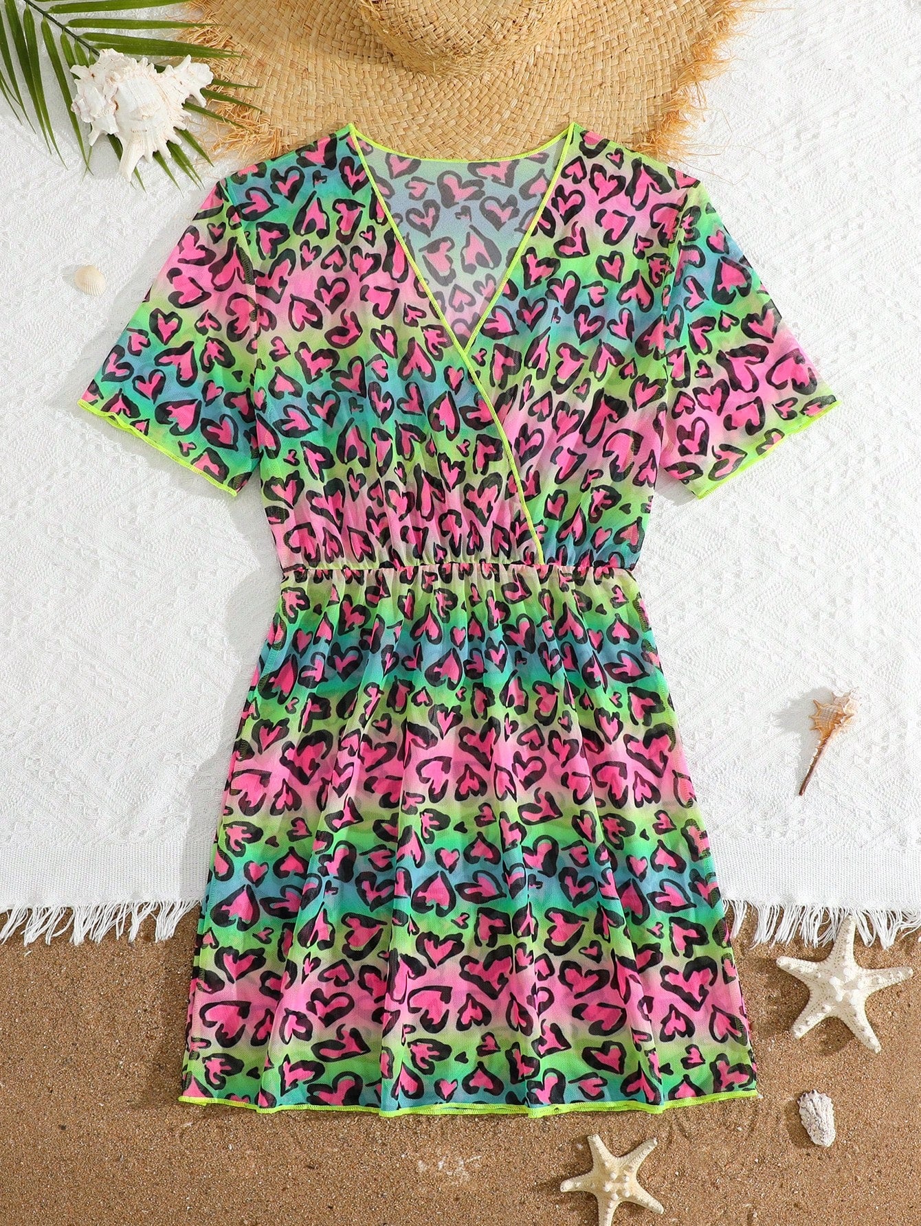 Multicolor heart print long cover up dress for tween girls featuring a V-neck criss-cross wrap front and short sleeves.