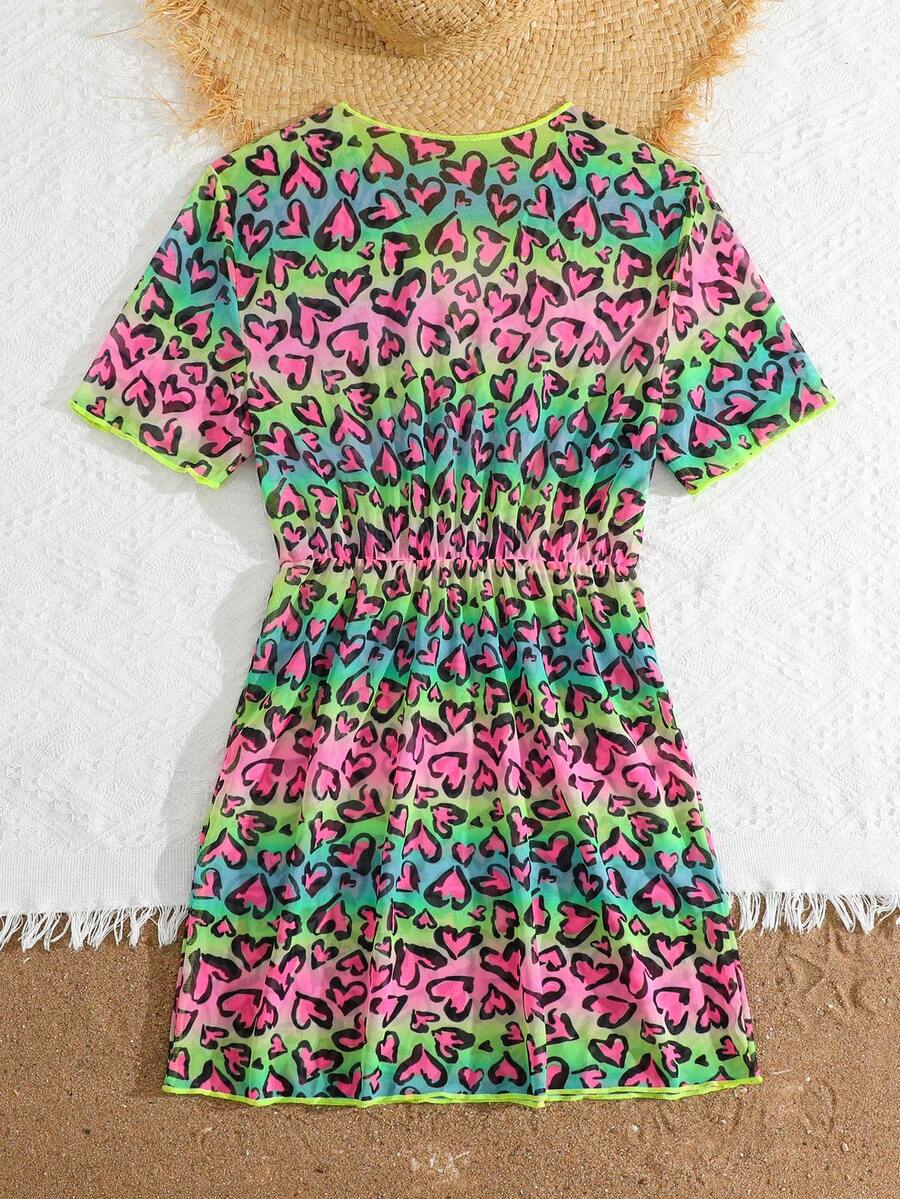 Multicolor heart print long cover up dress for tween girls featuring a V-neck criss-cross wrap front and short sleeves.