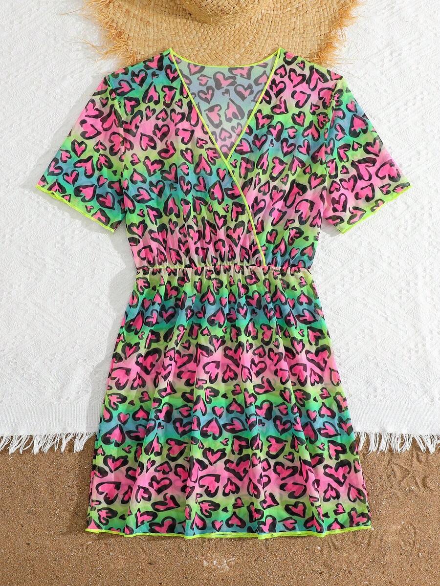 Multicolor heart print long cover up dress for tween girls featuring a V-neck criss-cross wrap front and short sleeves.