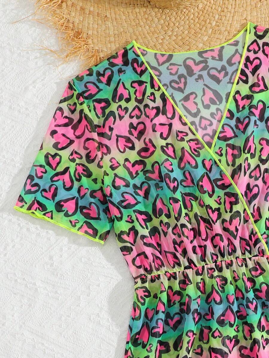 Multicolor heart print long cover up dress for tween girls featuring a V-neck criss-cross wrap front and short sleeves.