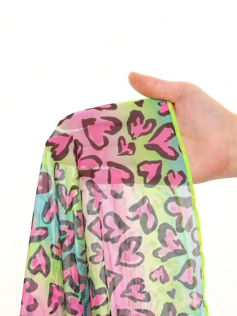 Multicolor heart print long cover up dress for tween girls featuring a V-neck criss-cross wrap front and short sleeves.