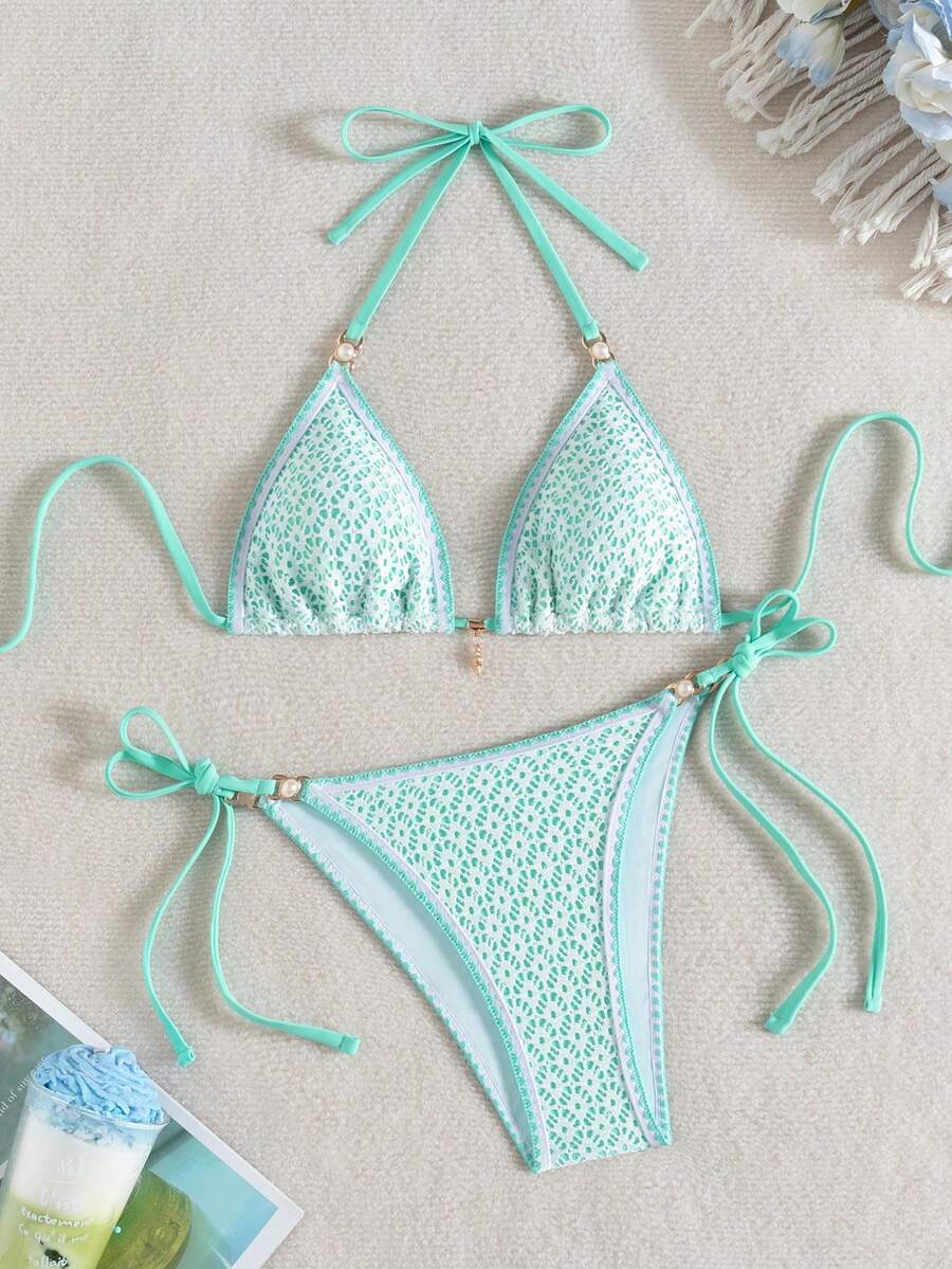 Women's triangle bikini set with contrast lace wireless bra top and ultra high waist tie side bottoms.