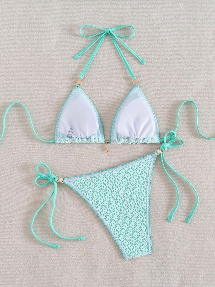 Women's triangle bikini set with contrast lace wireless bra top and ultra high waist tie side bottoms.