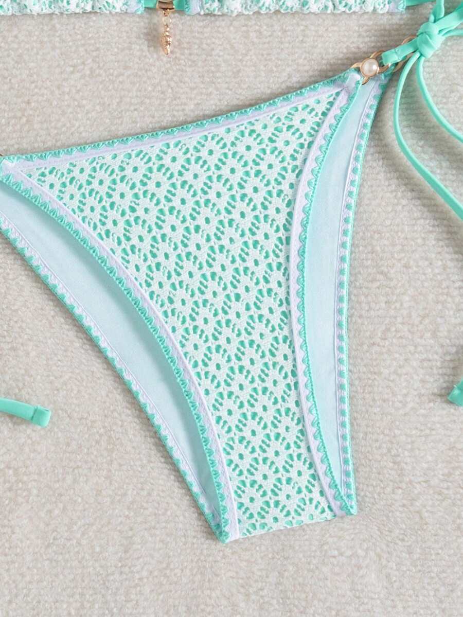 Women's triangle bikini set with contrast lace wireless bra top and ultra high waist tie side bottoms.