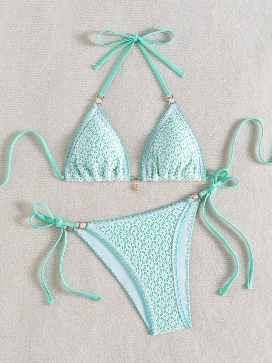 Women's triangle bikini set with contrast lace wireless bra top and ultra high waist tie side bottoms.