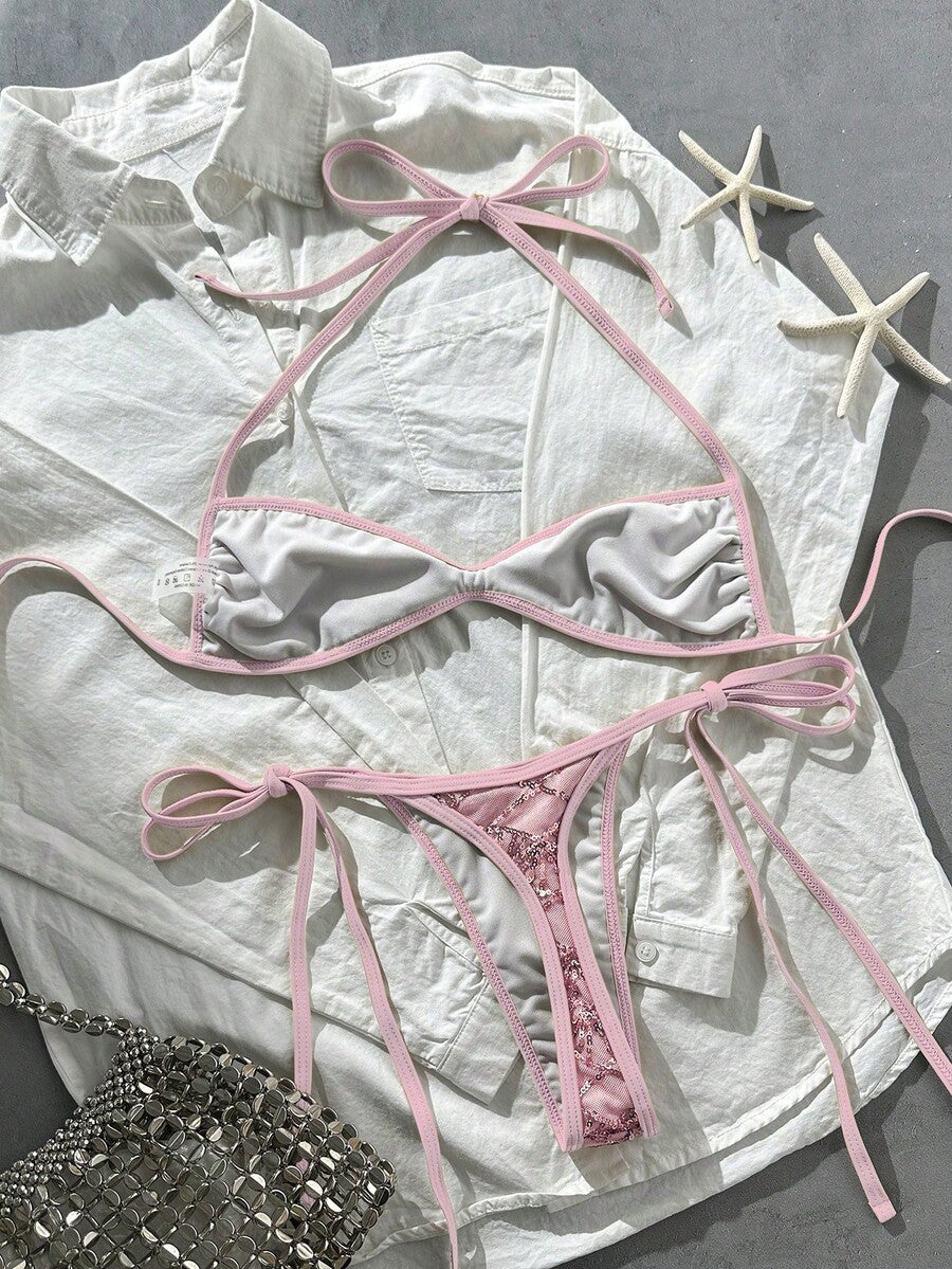 Apricot 2-piece sequin textured halter bikini set featuring a wireless top with lace-up backless ties and matching low-waist side-tie thong bottoms.