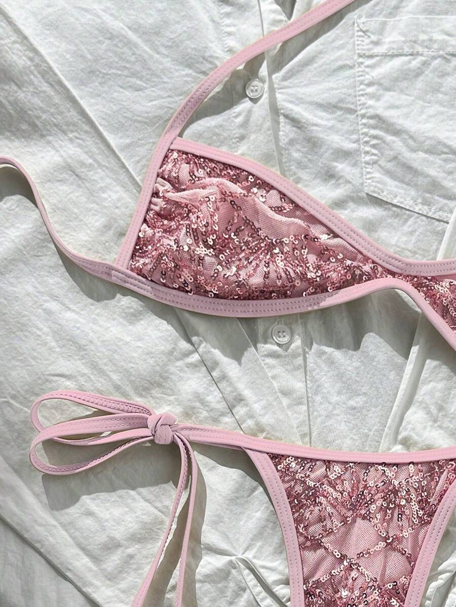 Apricot 2-piece sequin textured halter bikini set featuring a wireless top with lace-up backless ties and matching low-waist side-tie thong bottoms.