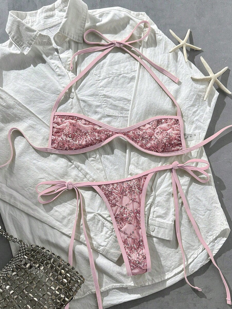 Apricot 2-piece sequin textured halter bikini set featuring a wireless top with lace-up backless ties and matching low-waist side-tie thong bottoms.