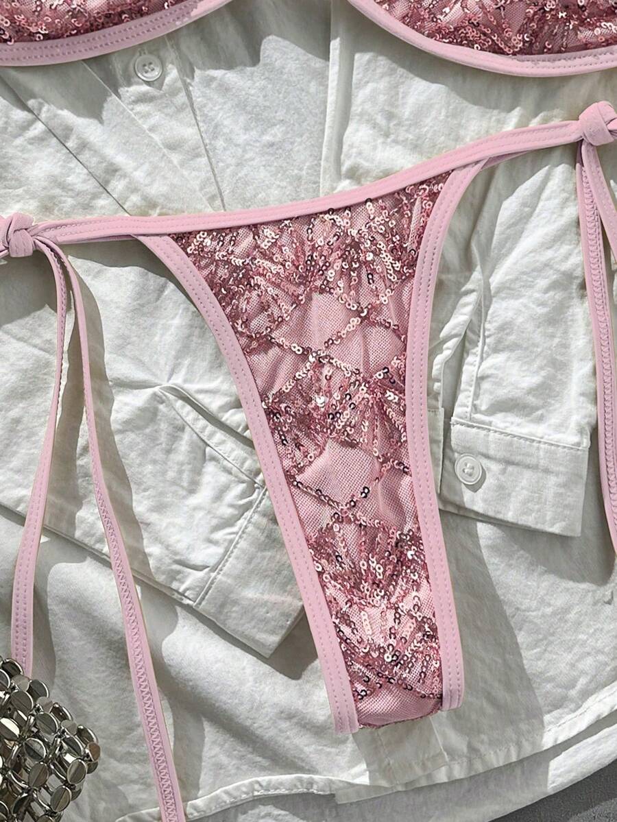 Apricot 2-piece sequin textured halter bikini set featuring a wireless top with lace-up backless ties and matching low-waist side-tie thong bottoms.