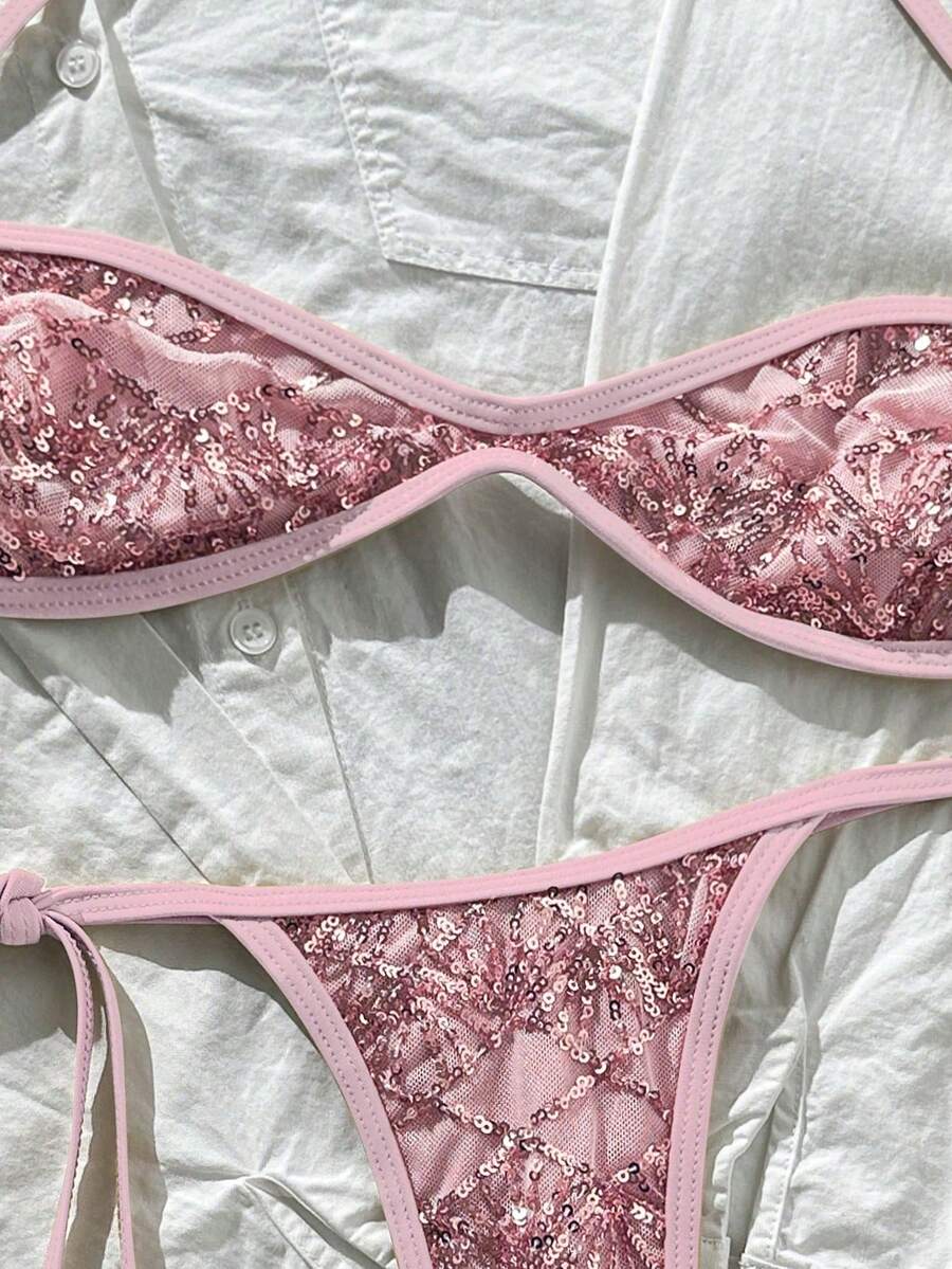 Apricot 2-piece sequin textured halter bikini set featuring a wireless top with lace-up backless ties and matching low-waist side-tie thong bottoms.
