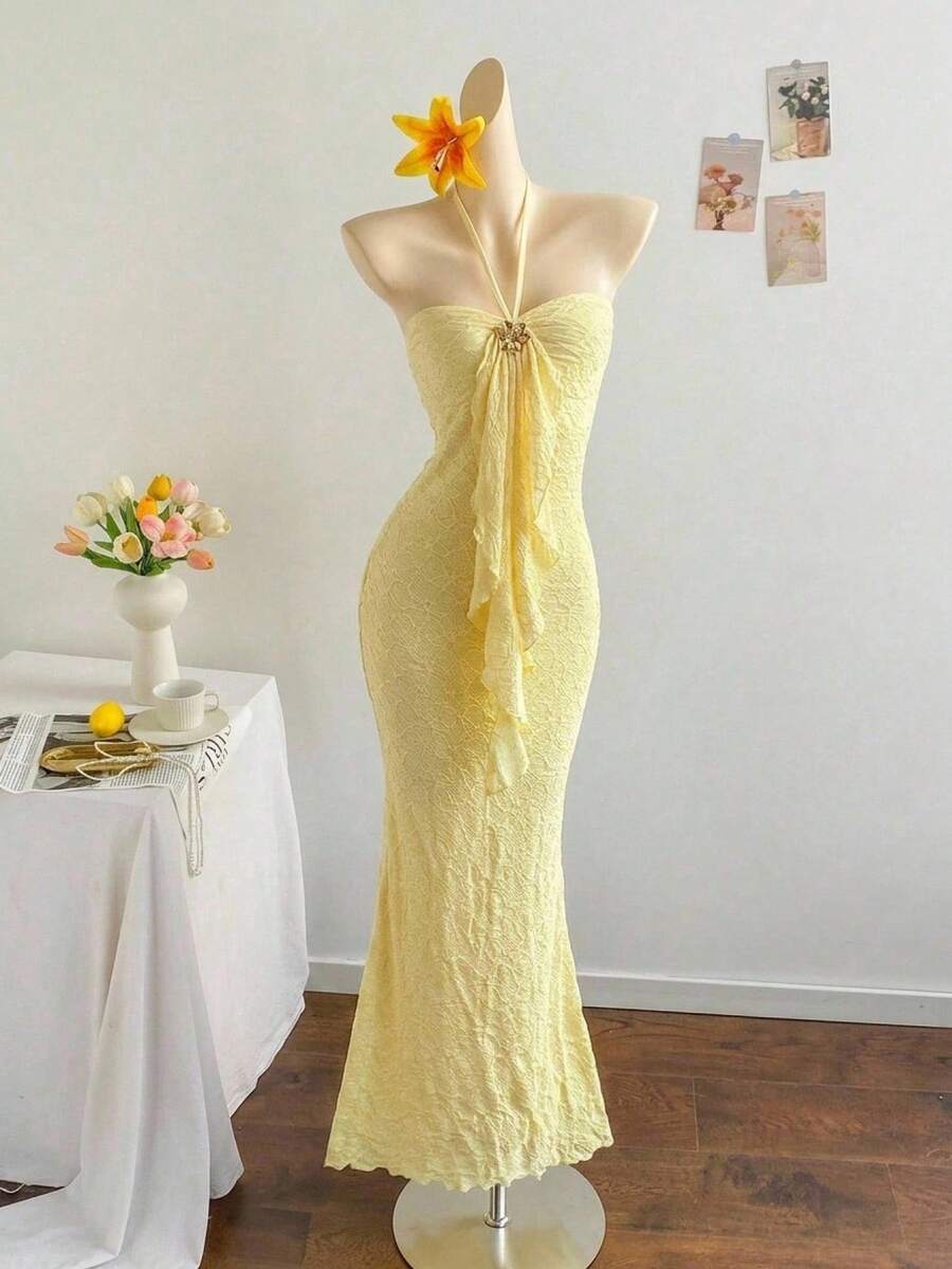 Tween girl yellow long halter dress with textured jacquard knit, sleeveless slim fit cami design, natural waist, straight hem, and lined non-sheer finish for vacation or party wear.